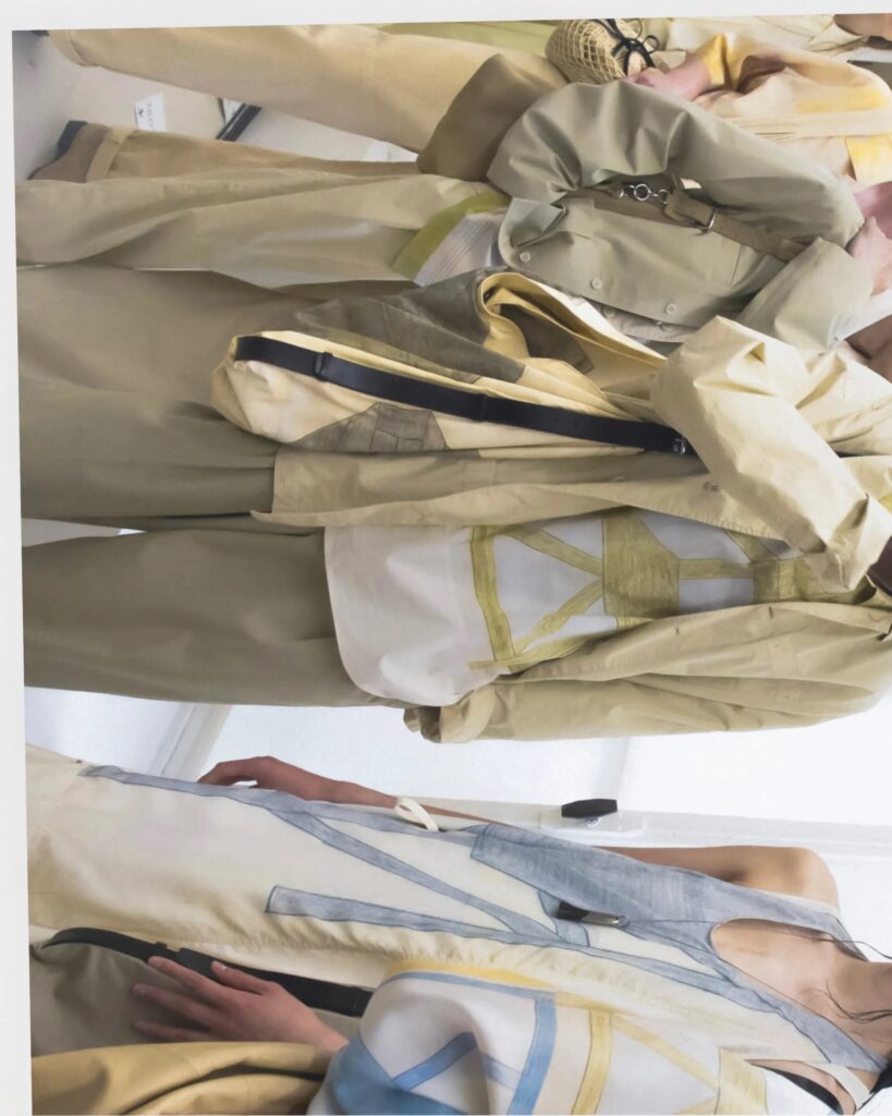 Layered beige and pastel yellow pieces from Lemaire Spring-Summer 2025 collection.