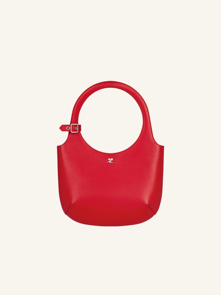 Courrèges Holy bag in vibrant red with a sleek circular handle, showcasing its minimalist and modern design.