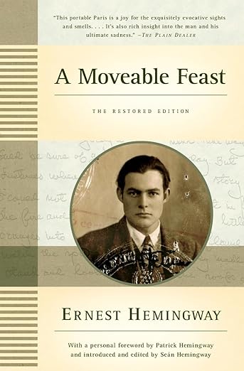 Cover of A Moveable Feast by Ernest Hemingway, a memoir set in Paris depicting the city’s literary and artistic life.