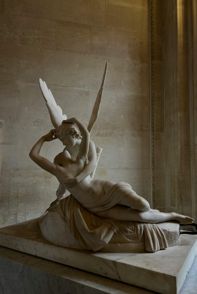 Cupid and Psyche marble sculpture at the Louvre Museum in Paris.