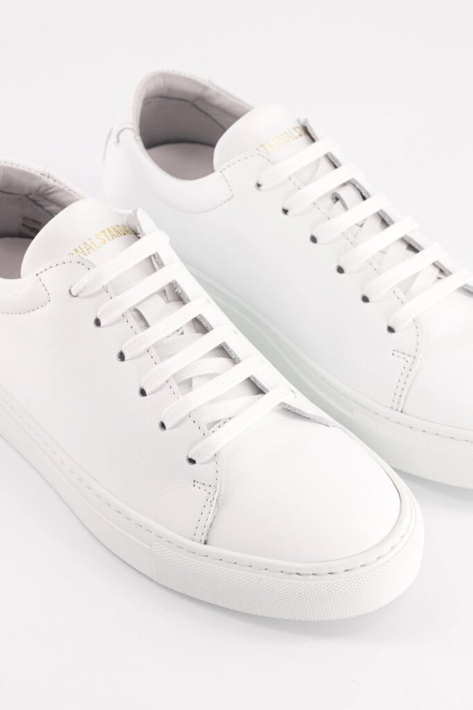 Close-up of National Standard white leather sneakers, one of the best minimalist French sneaker brands.