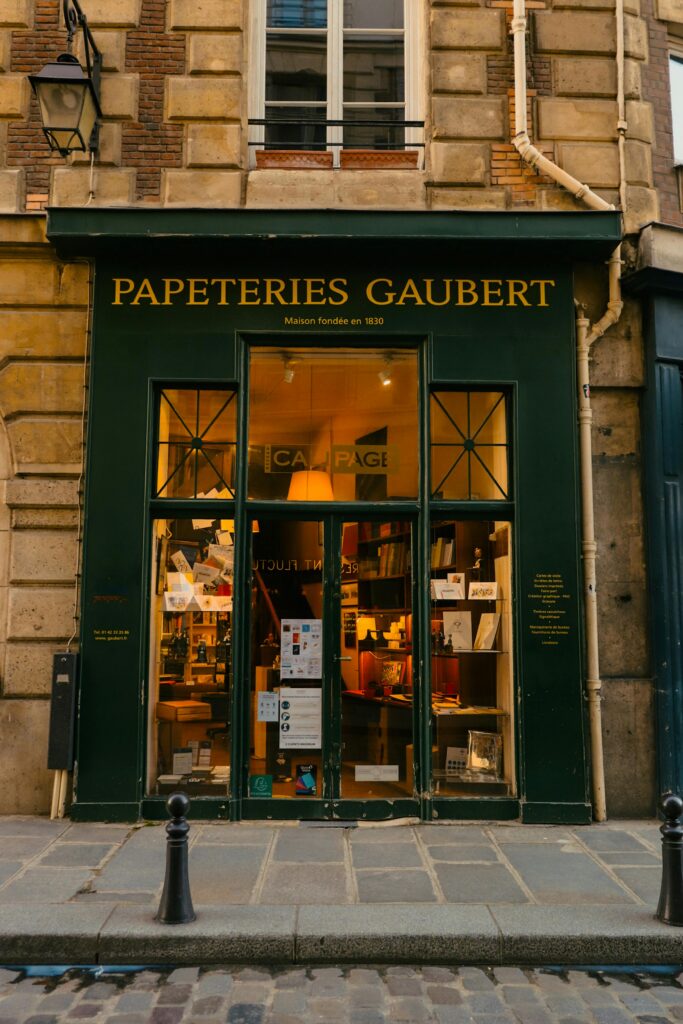 The exterior of Papeteries Gaubert, a historic stationery shop in Paris known for high-quality paper and writing accessories, essential what to buy in Paris.