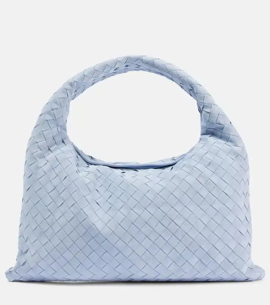 Light blue suede Bottega Veneta Hop bag, one of the top bag trends 2025