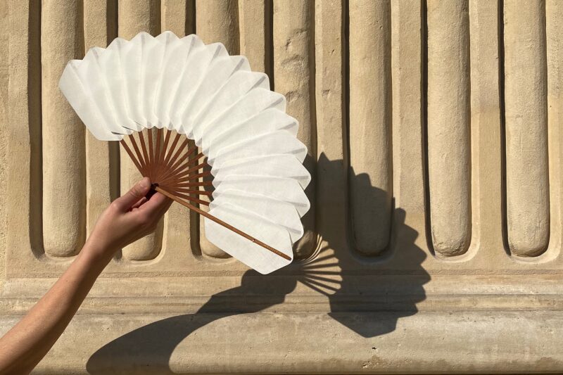 White cotton folding fan from Duvelleroy – one of the most elegant souvenirs from Paris