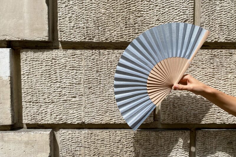 Silver and nude-toned folding fan from Duvelleroy – a sophisticated souvenir from Paris