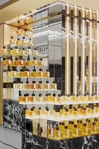 Luxurious mirrored display of Celine Haute Parfumerie inside Le Bon Marché. french perfume shops in paris