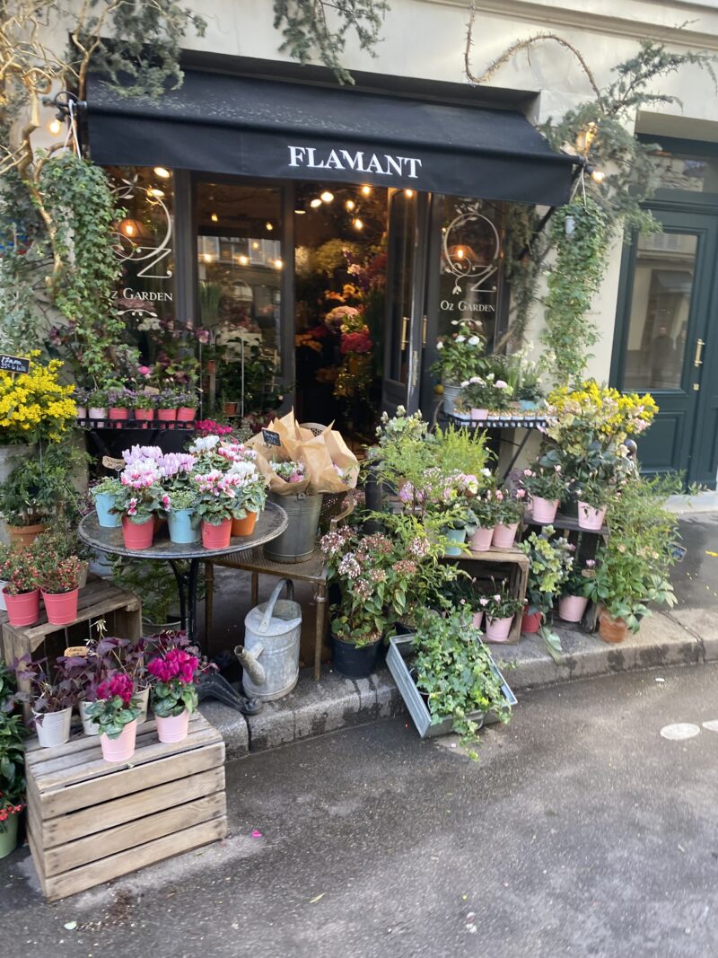 Colorful flower display outside Oz Garden florist in Paris