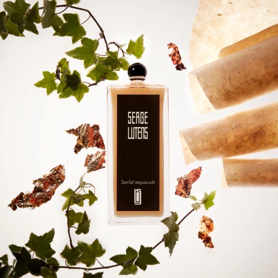 Santal Majuscule perfume by Serge Lutens with foliage and texture details