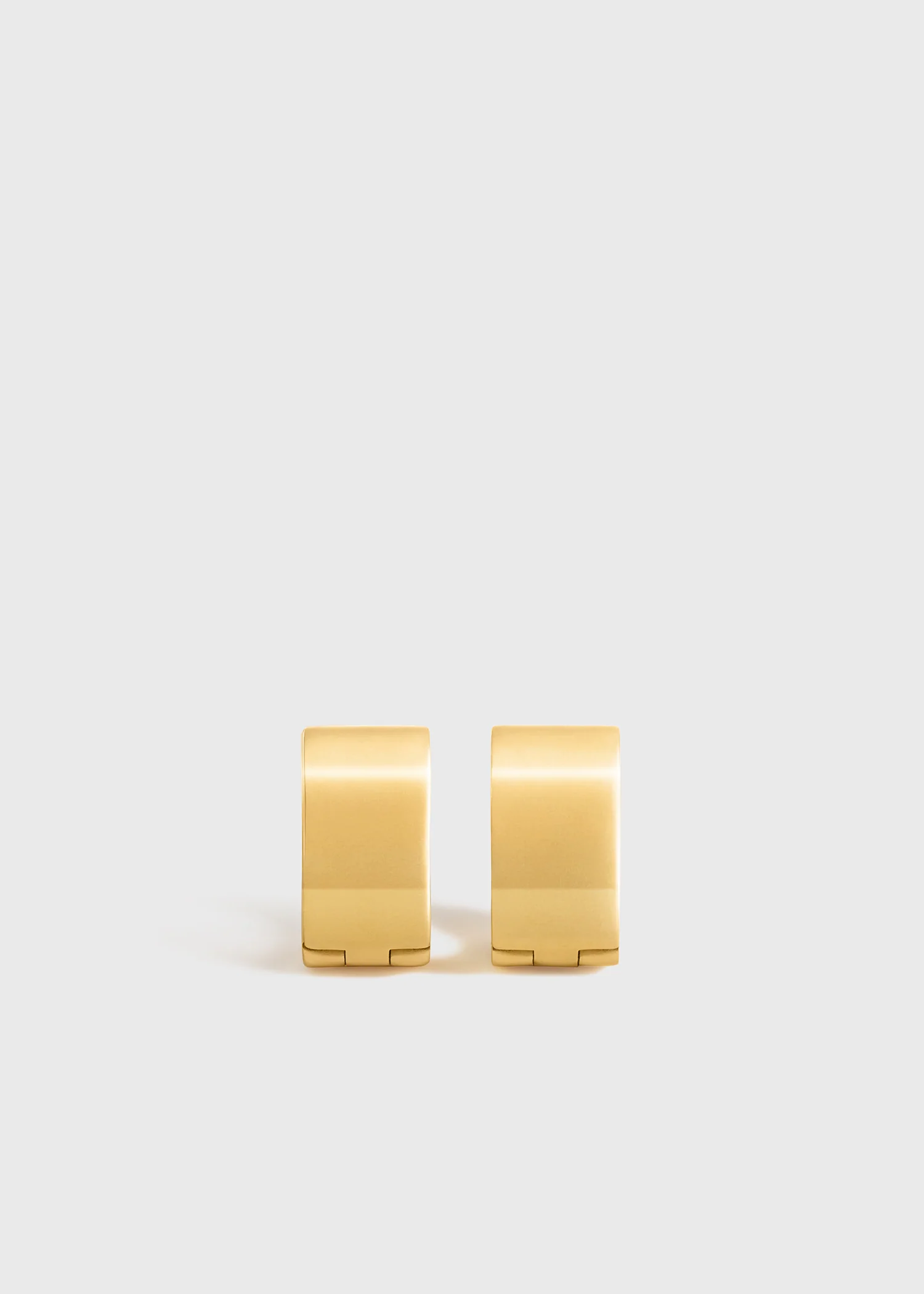 Toteme hoop earrings perfect for a heatwave outfit in Paris