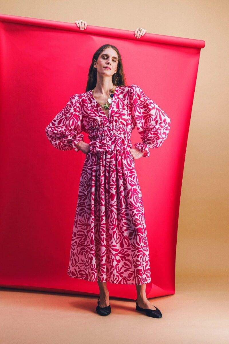 Model wearing red and white printed set by Elise Chalmin, a joyful brand like Sézane