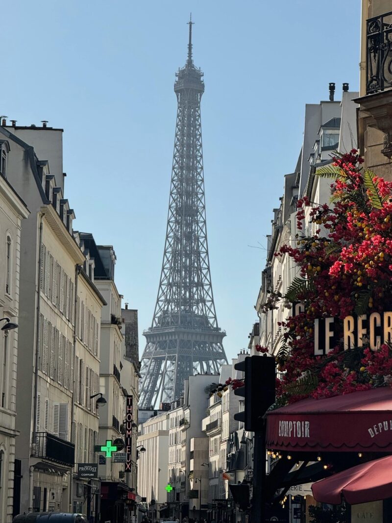 Eiffel Tower seen from a quiet street in Paris 7th arrondissement