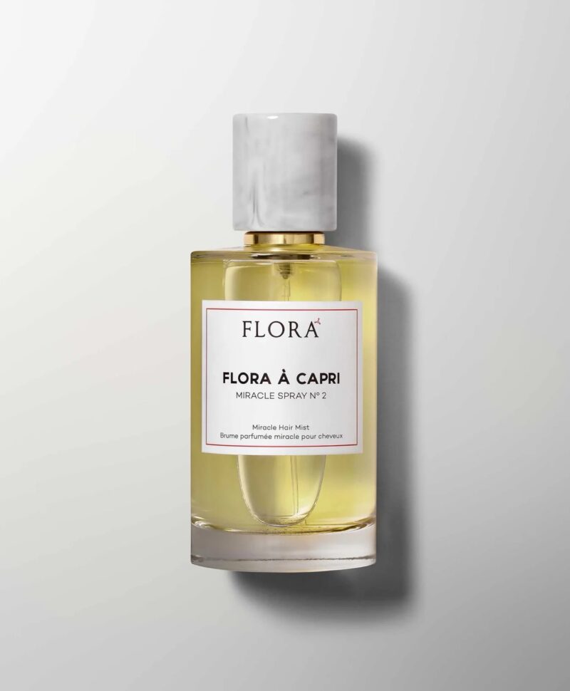 Flora Lab No. 5 oil spray bottle on marble background