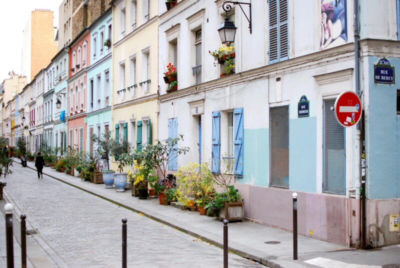 Colorful pastel houses lining Rue Crémieux in Paris’s 12th arrondissement