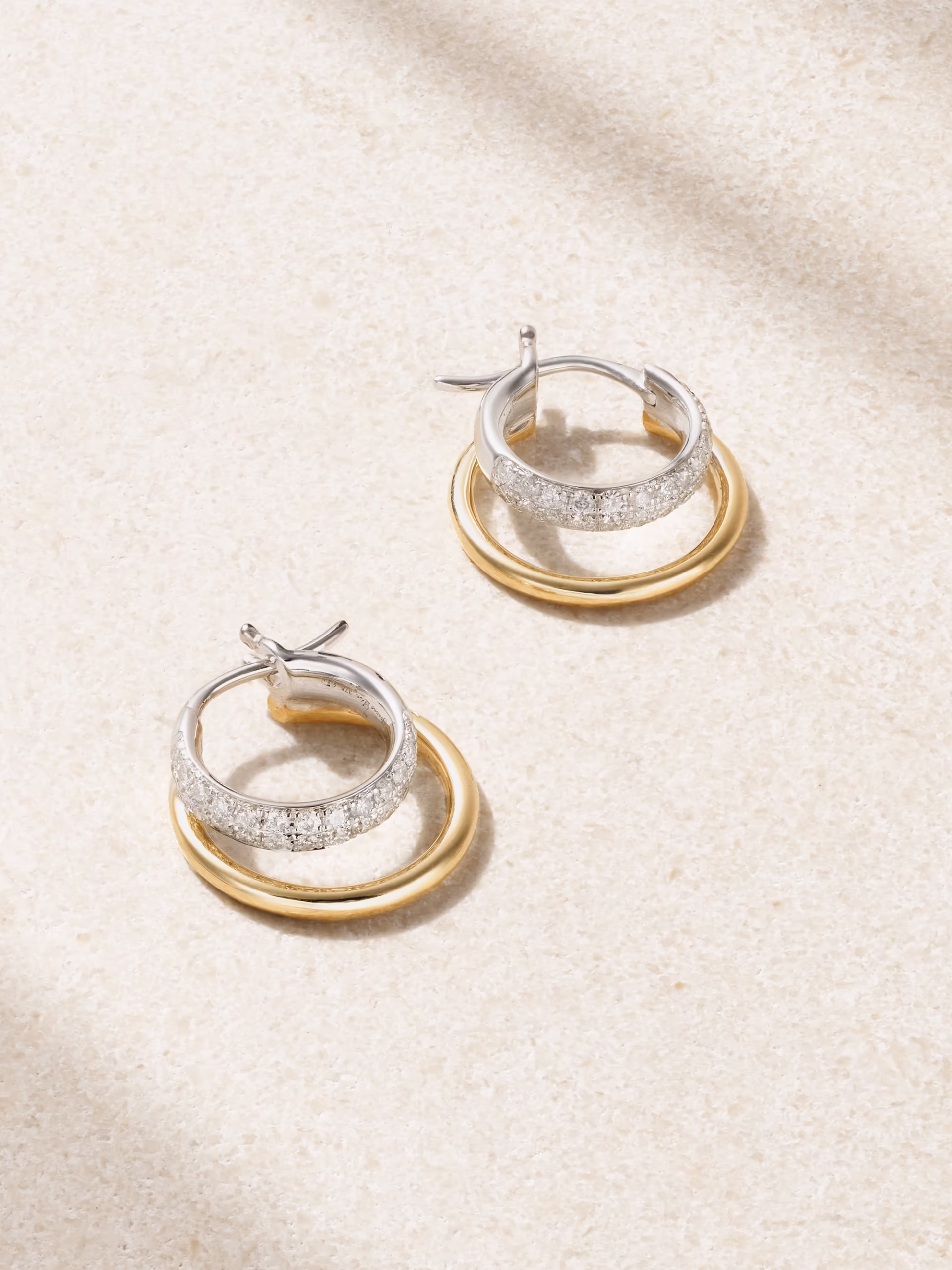 parisian style signature gold jewelry by the brand Yvonne Léon of 10 Parisian Style Staples You Can Add to Your Closet Right Now