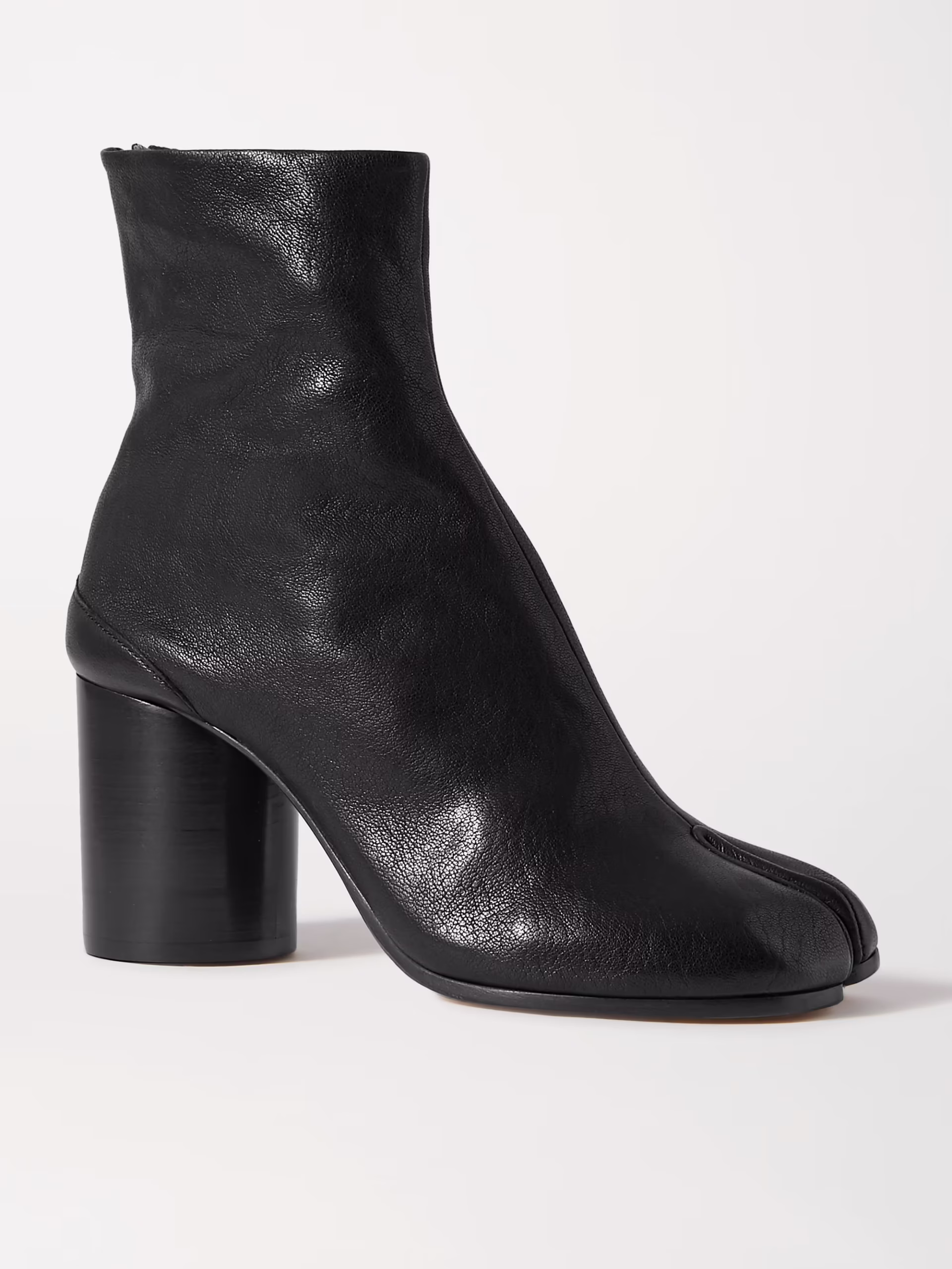 parisian style The heeled ankle boot by the brand Maison Margiela 10 Parisian Style Staples You Can Add to Your Closet Right Now