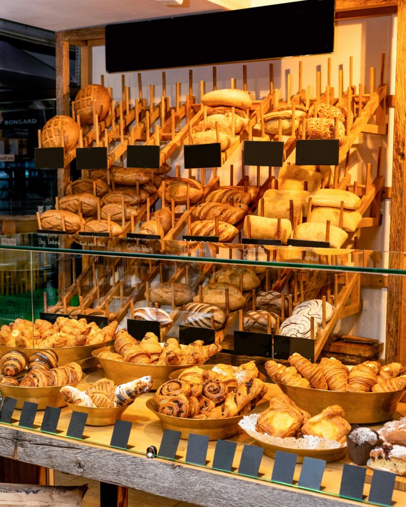 Baguettes and pastries displayed in a traditional French boulangerie