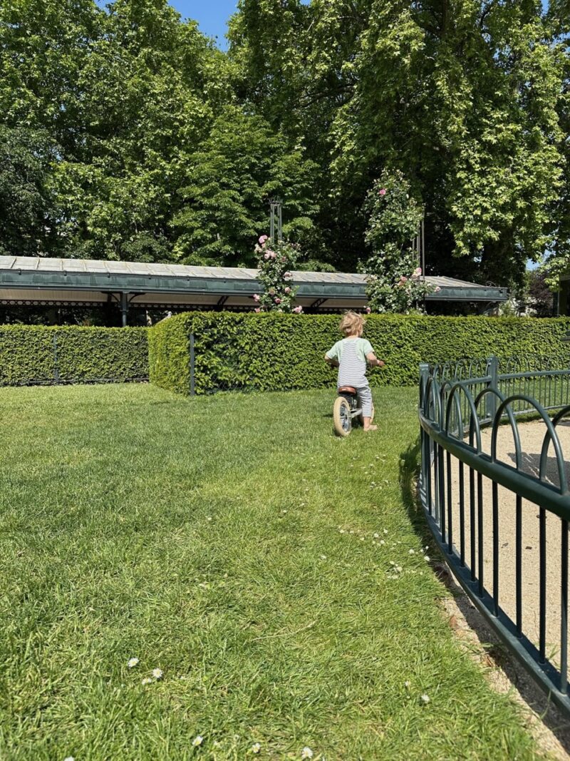 Child playing at the playground in Jardin du Luxembourg, Paris