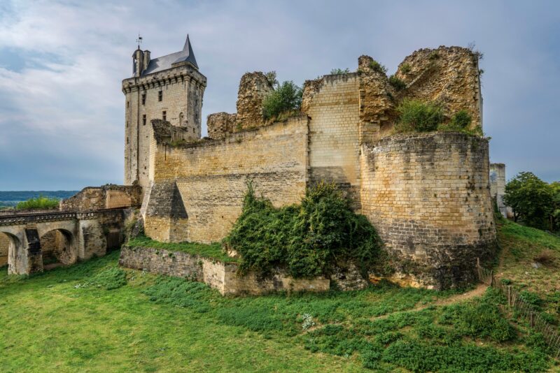Château de Chinon, a medieval fortress in the Loire Valley France with stone ramparts and towers.
