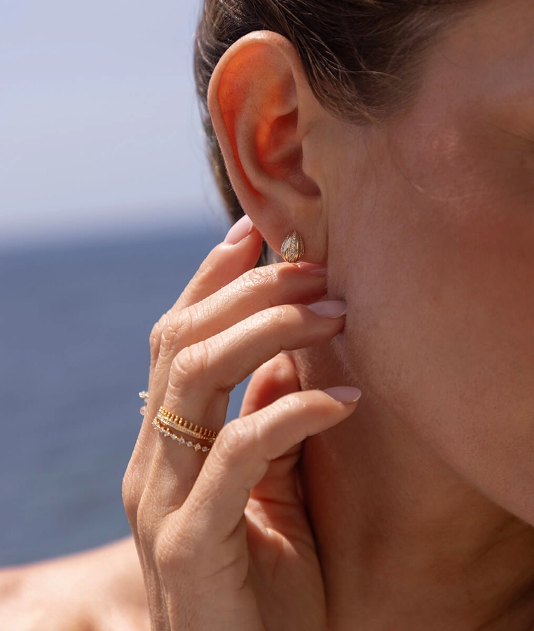 Layered gold rings from Atelier d’Amaya