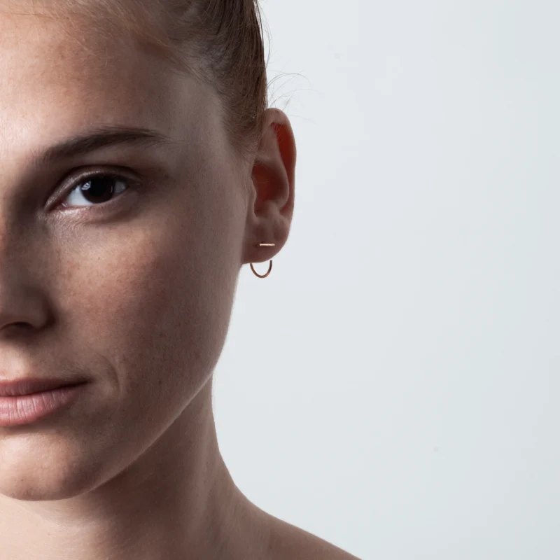 Minimalist gold hoops by Atelier Paulin