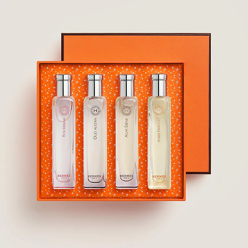 Hermès Hermessence perfume bottles with orange packaging