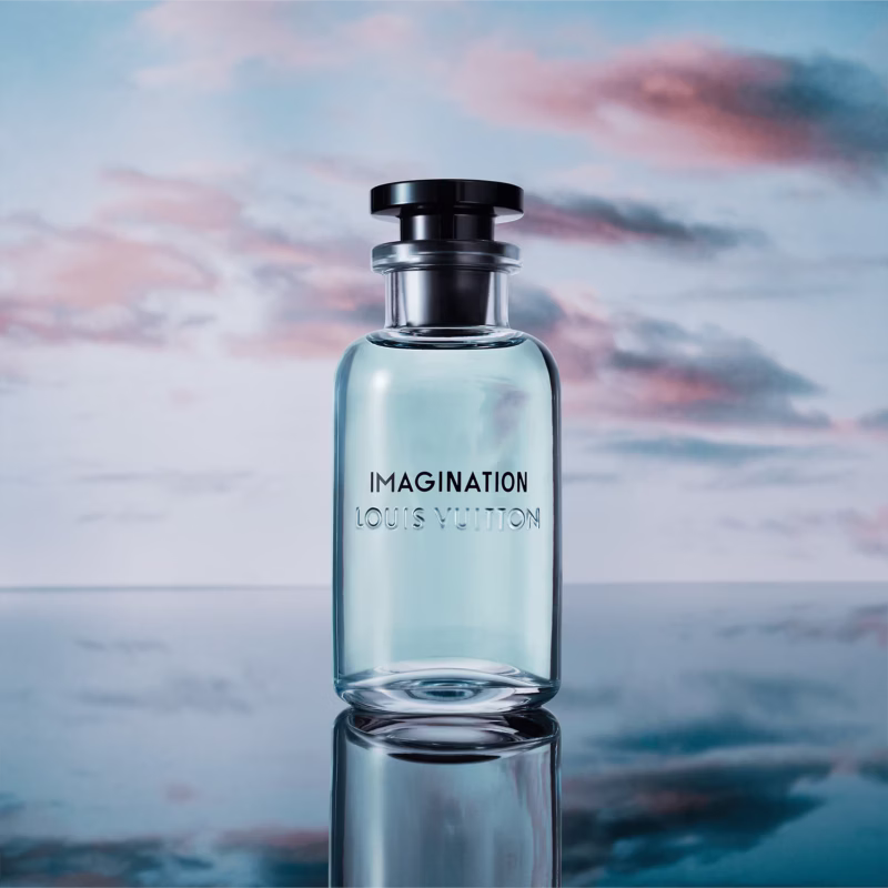 Louis Vuitton Imagination perfume bottle photographed with travel-inspired lighting