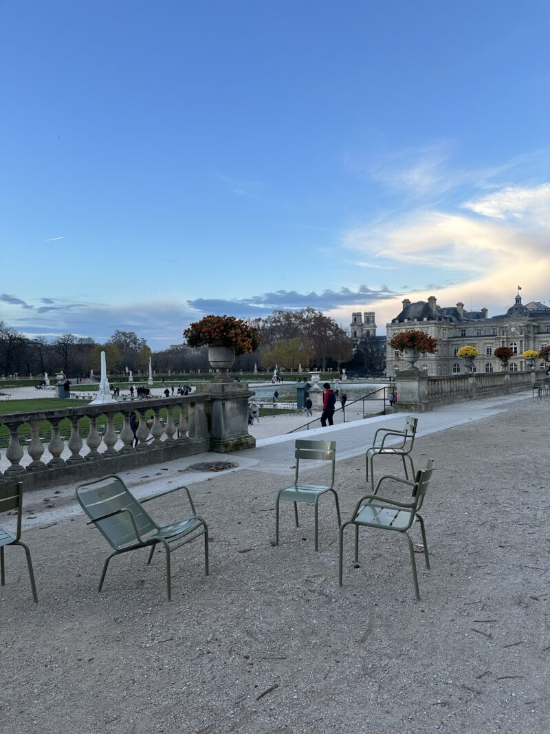 Empty chairs and winter trees at Jardin du Luxembourg in Paris in December.