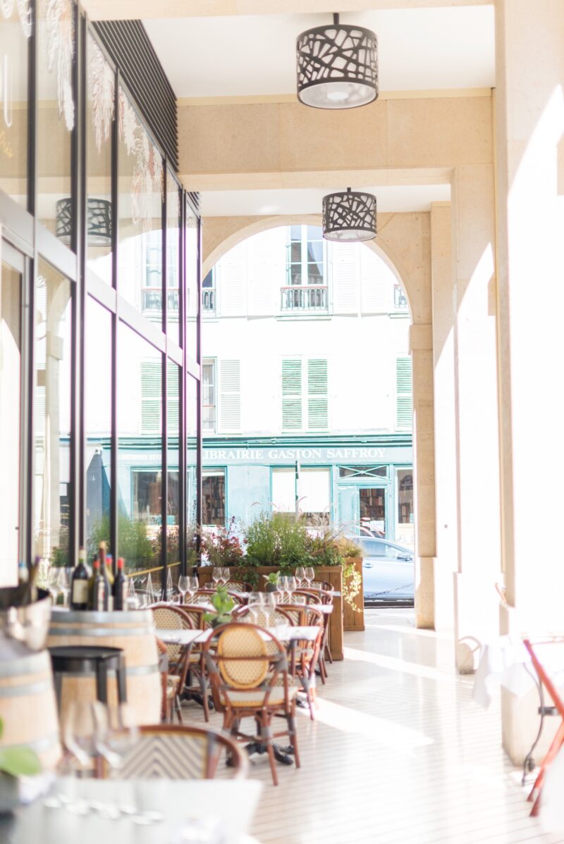 Parisian café terrace on Rue Félibien in Saint-Germain-des-Prés, Paris. Things to do in Saint-Germain Paris.