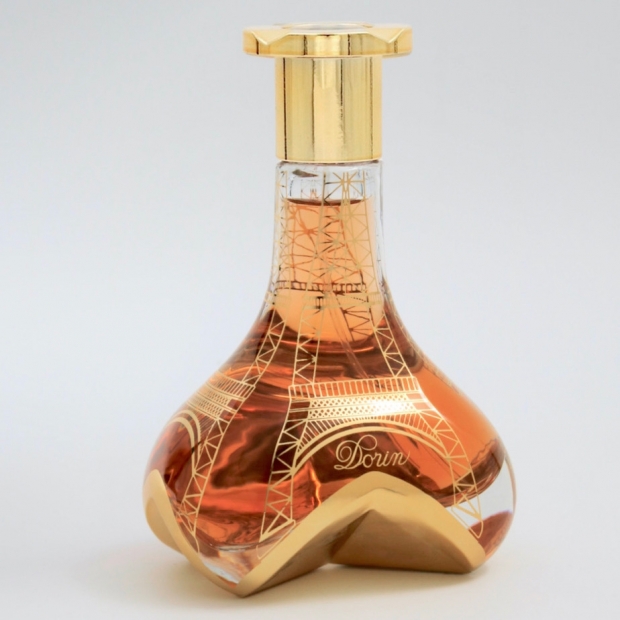 Maison Dorin perfume bottle decorated with the Eiffel Tower, representing one of the oldest French perfume brands.